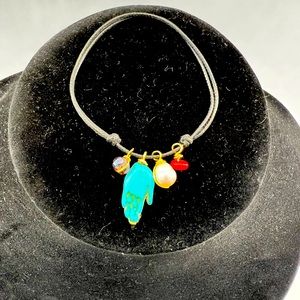 Boho Bracelet w/Turquoise “Hand” Surrounded by Beads On Black Clasp Rope